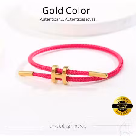 Pulsera femenina fucsia con detalle dorado elegante