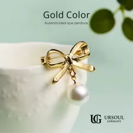Charm decorativo para dama Gold Color con lazo dorado y perla natural Ursoul Germany