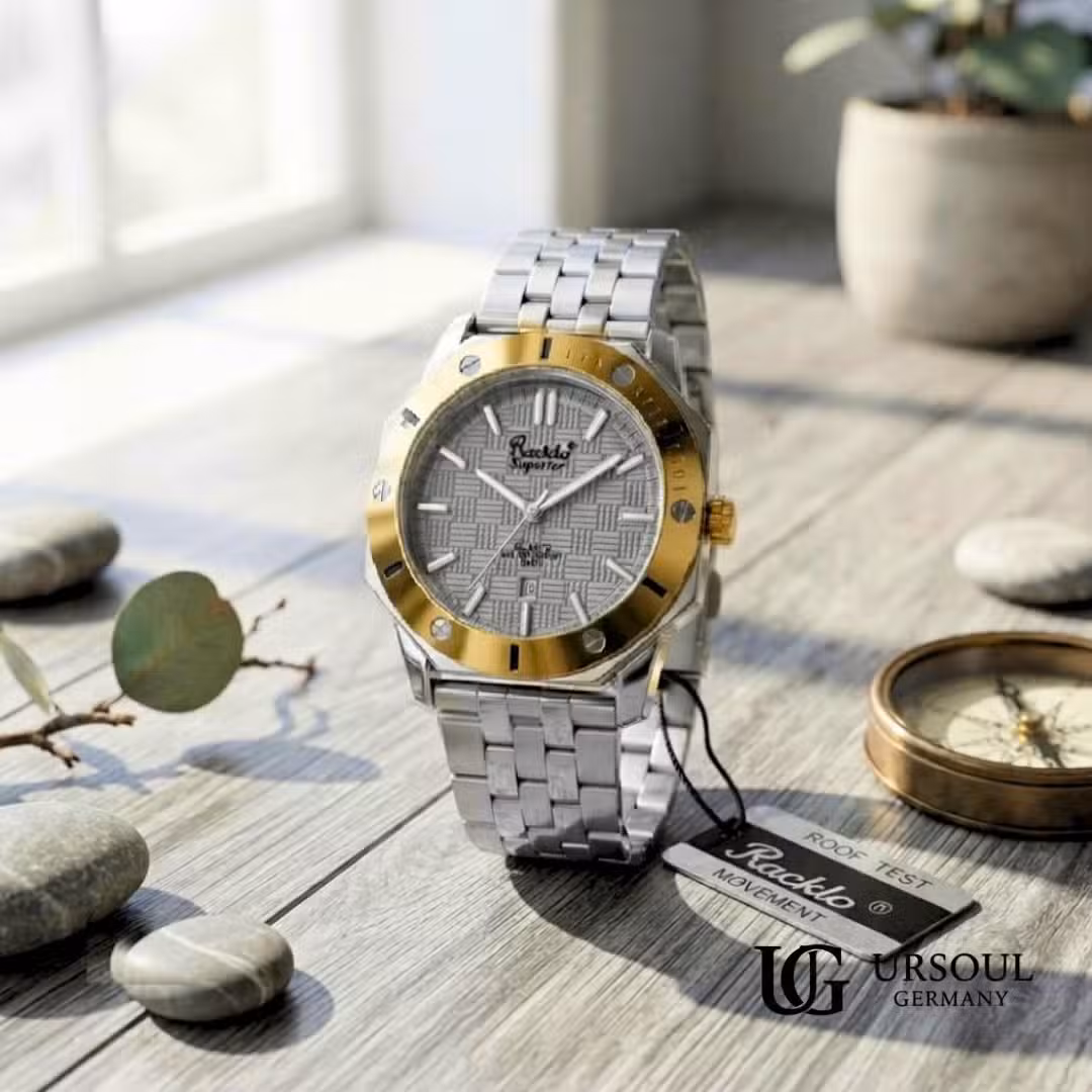 3 Reloj Racklo bicolor acero y dorado con movimiento Miyota, carátula texturizada y etiqueta de garantía, elegido por Ursoul Germany.